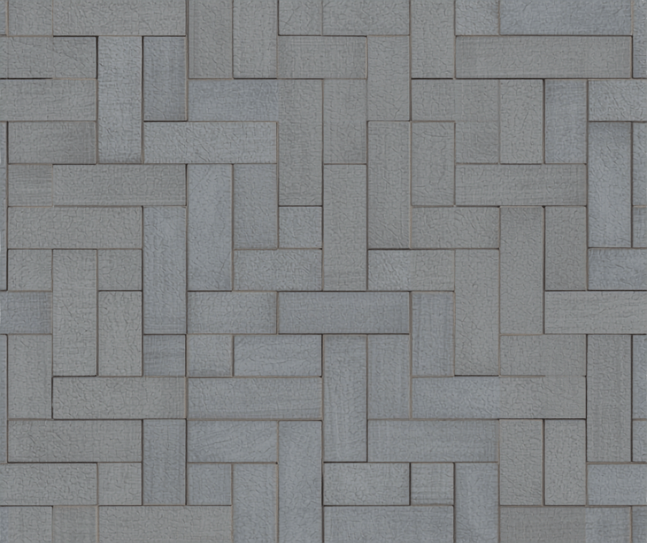 Close-up top-down shot of herringbone-pattern grey block paving, freshly laid with clean edging, photorealistic